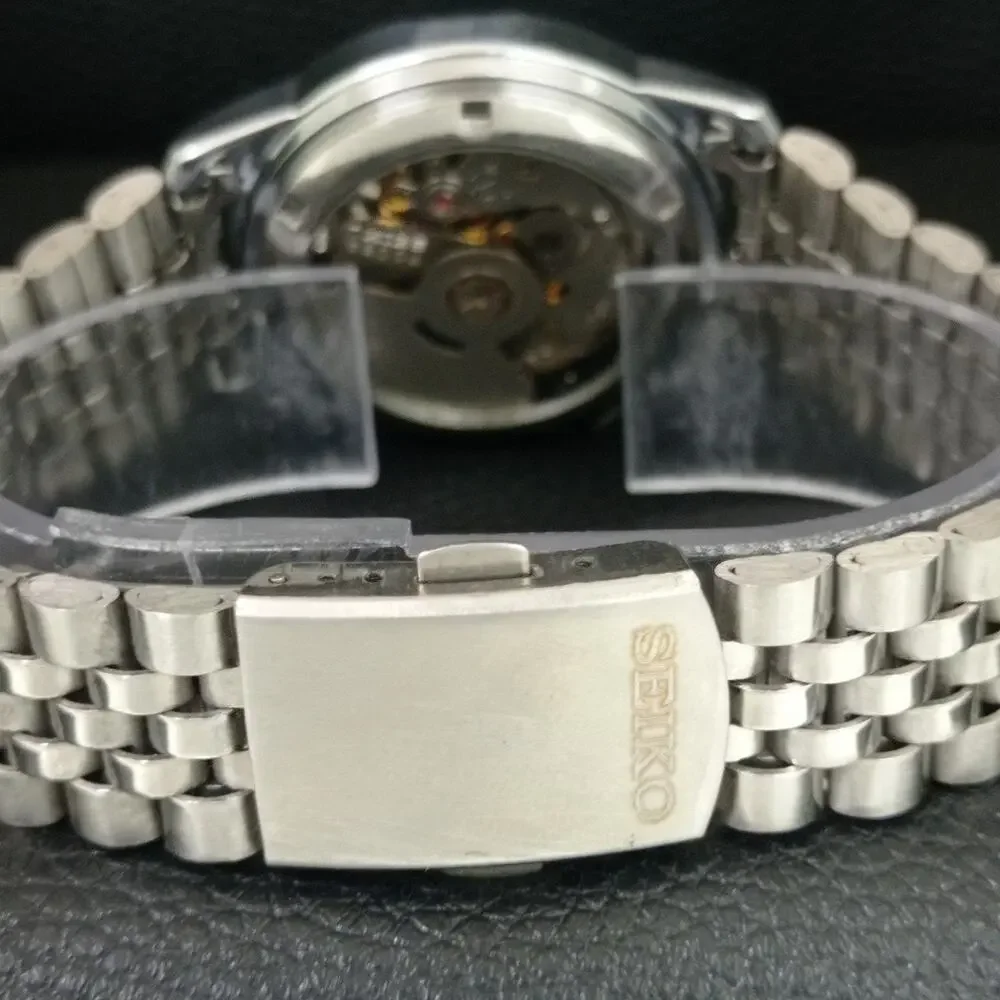 Vintage 1982 Seiko Automatic Mens Silver Watch W/daydate & Champagne accents